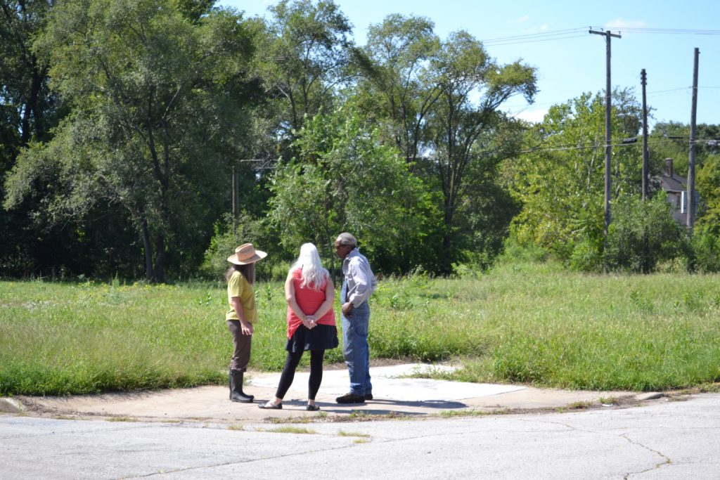 Frances Whitehead, Deb Backhus, and Walter Jones survey the site for Fruit Futures Initiative Gary. Courtesy the artist.