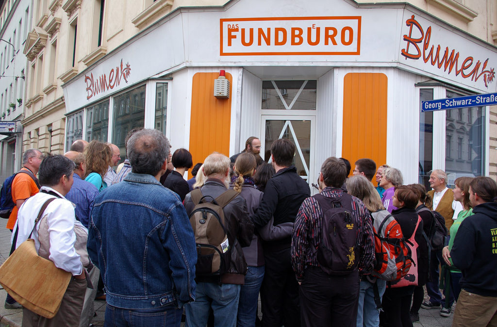 Fundbuero visitors gather for a walking tour of the Lindenau neighborhood led by Rainer Muller. Photo by Monica Sheets.